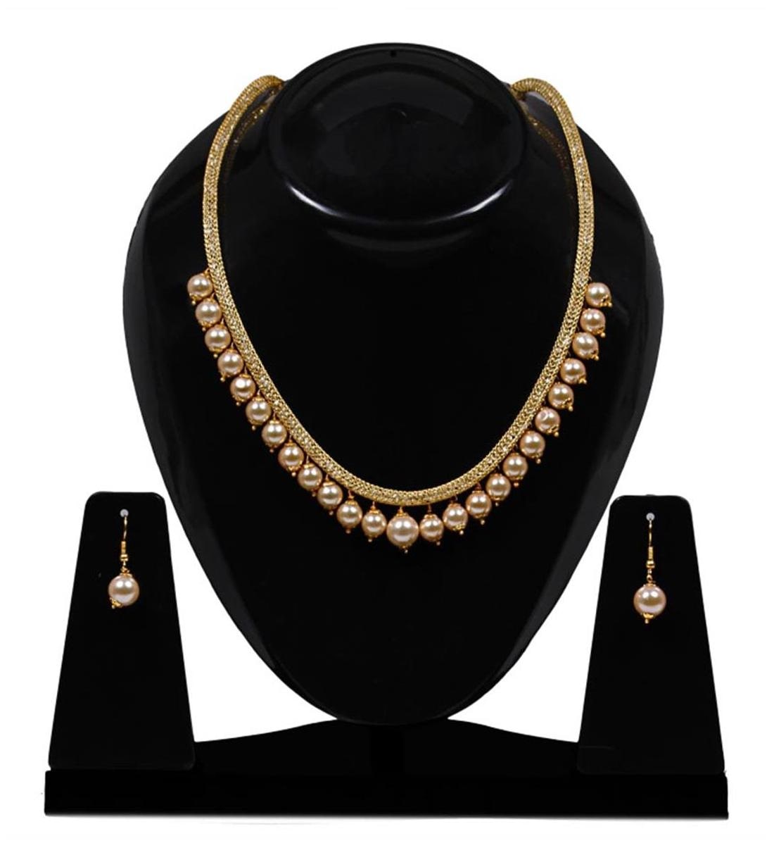 

Penny Jewels Golden Alloy Necklace Set