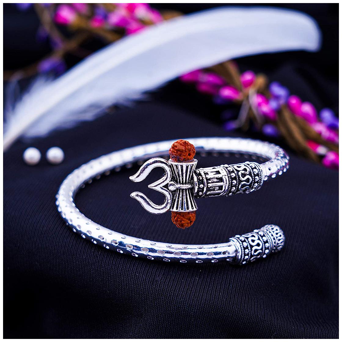 

Princy Enterprise Rutrishul Damroo Designer Oxidized Kada For Men