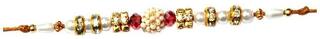 Purvani Set of 1 Rakhi /Pearl/Rudraksha/Om/Ganesh/Swastika/Crystal/Brother Rakhi with Rakhi Card & Roli & Chawal