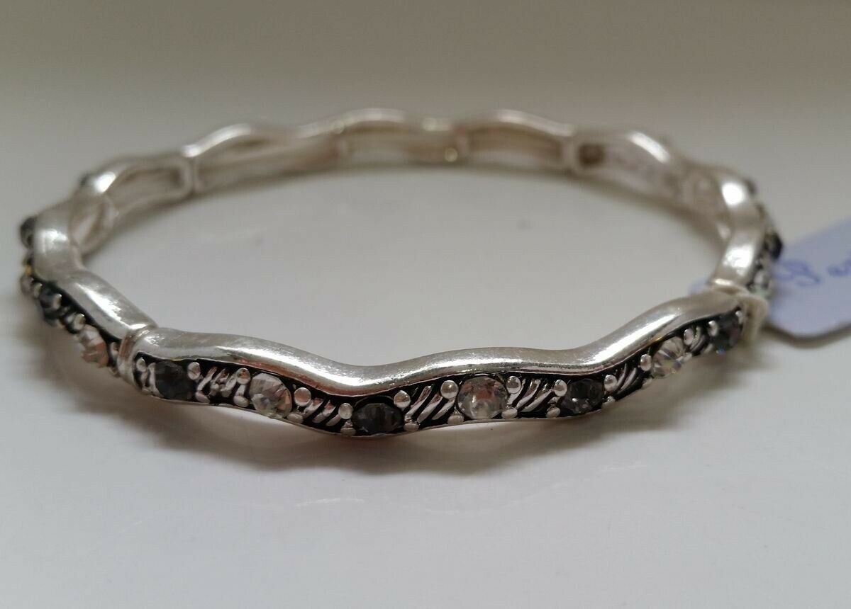 

Silver-tone Textured Filigree Stretch Bracelet Clear and Gray crystals F2-10 22