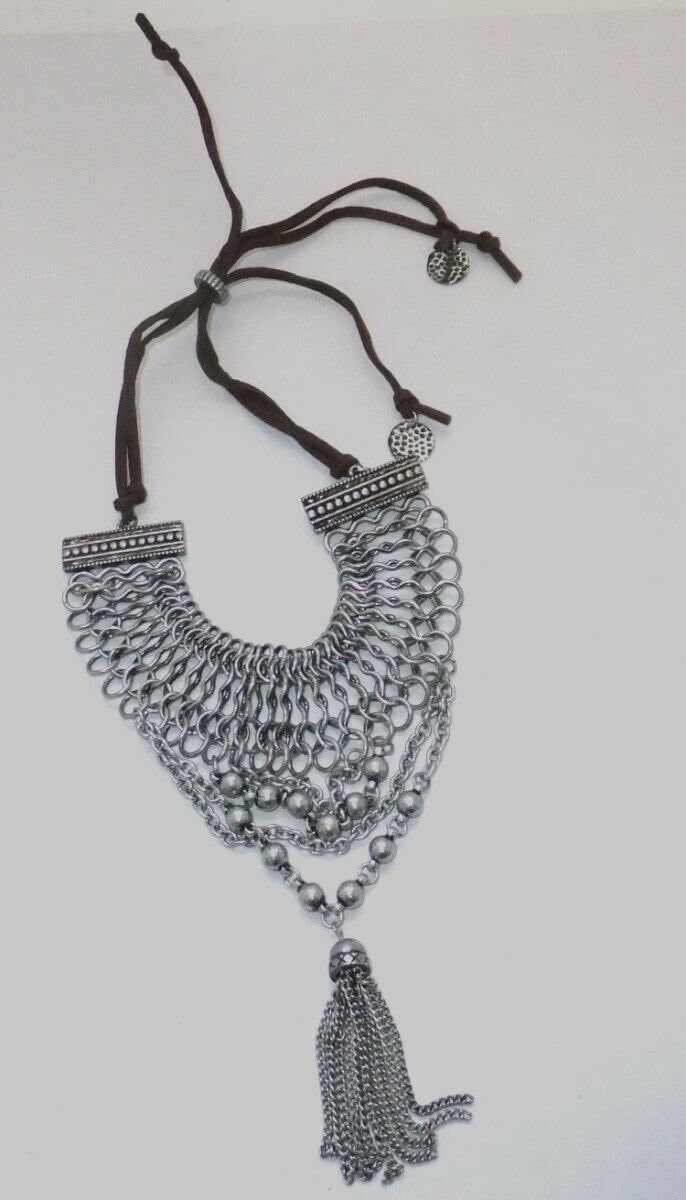 

Silver tone upper arm chains bracelet with chain tassel brown strings Of Z-10