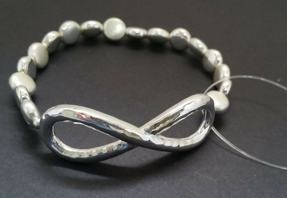 

Silver-tone Shiny Metal beads Stretch Bracelet w Infinity sign symbol Z2-16 22