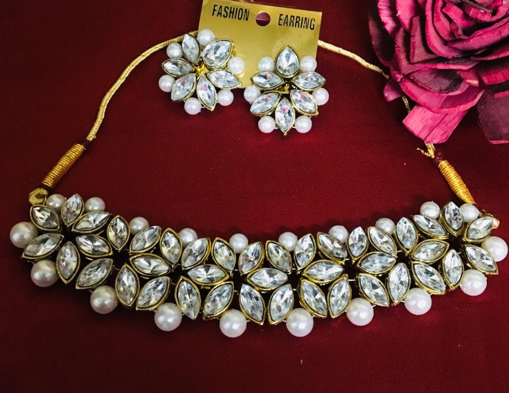 

Sparkeve White Pearls And Gold Pated Kundan Choker Necklace Set
