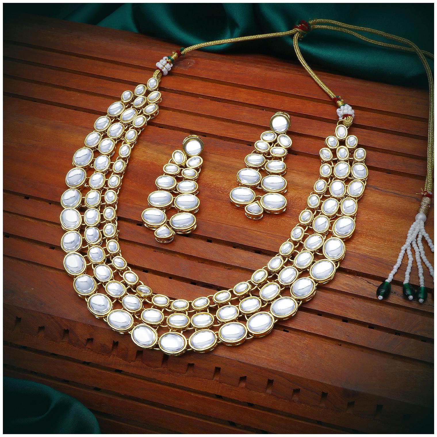 

Sukkhi Ritzy Gold Plated Wedding Jewellery Kundan Choker Necklace Set for Women