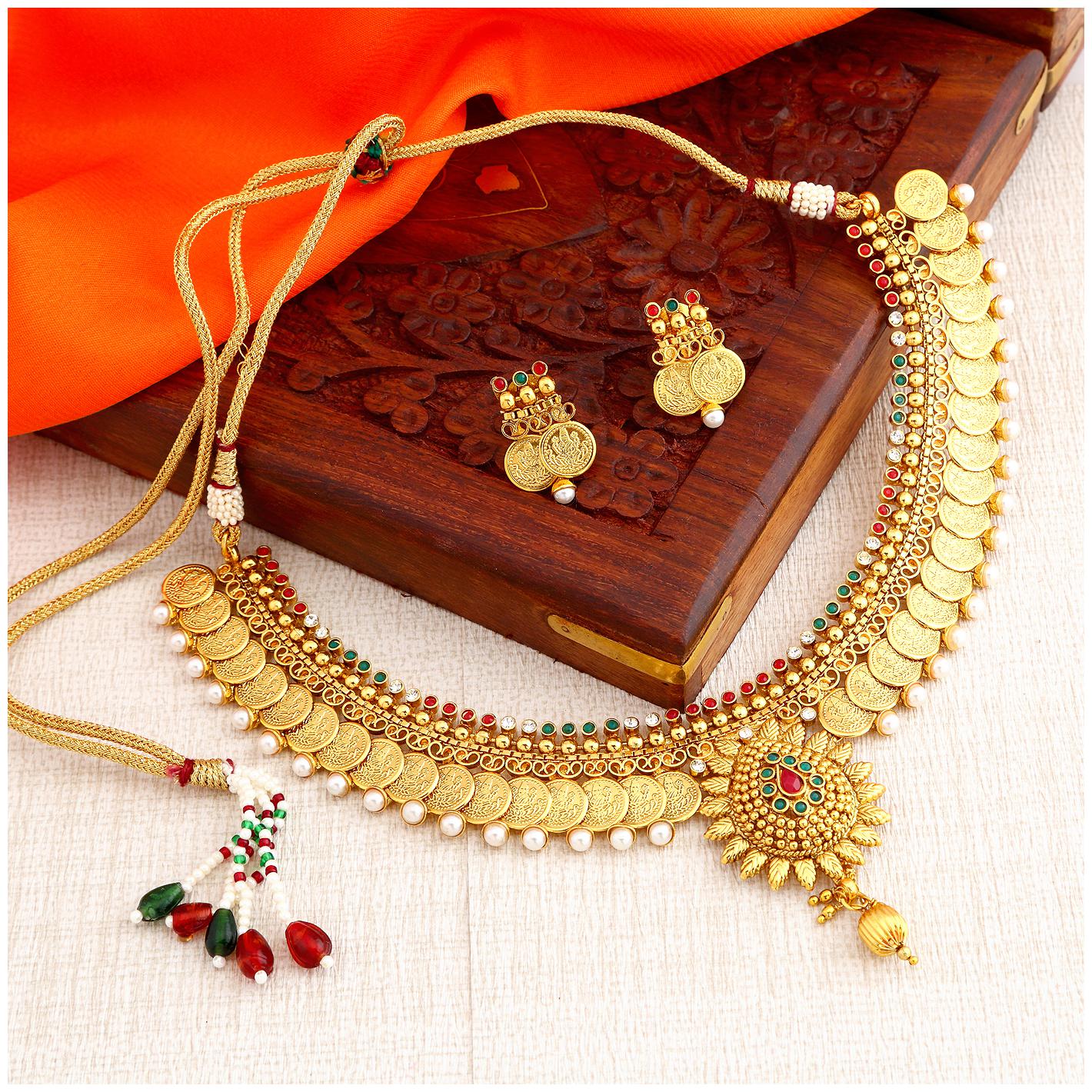 

Sukkhi Eye-Catchy Pearl Gold Plated Wedding Jewellery Temple Jewellery Coin Necklace Set For Women