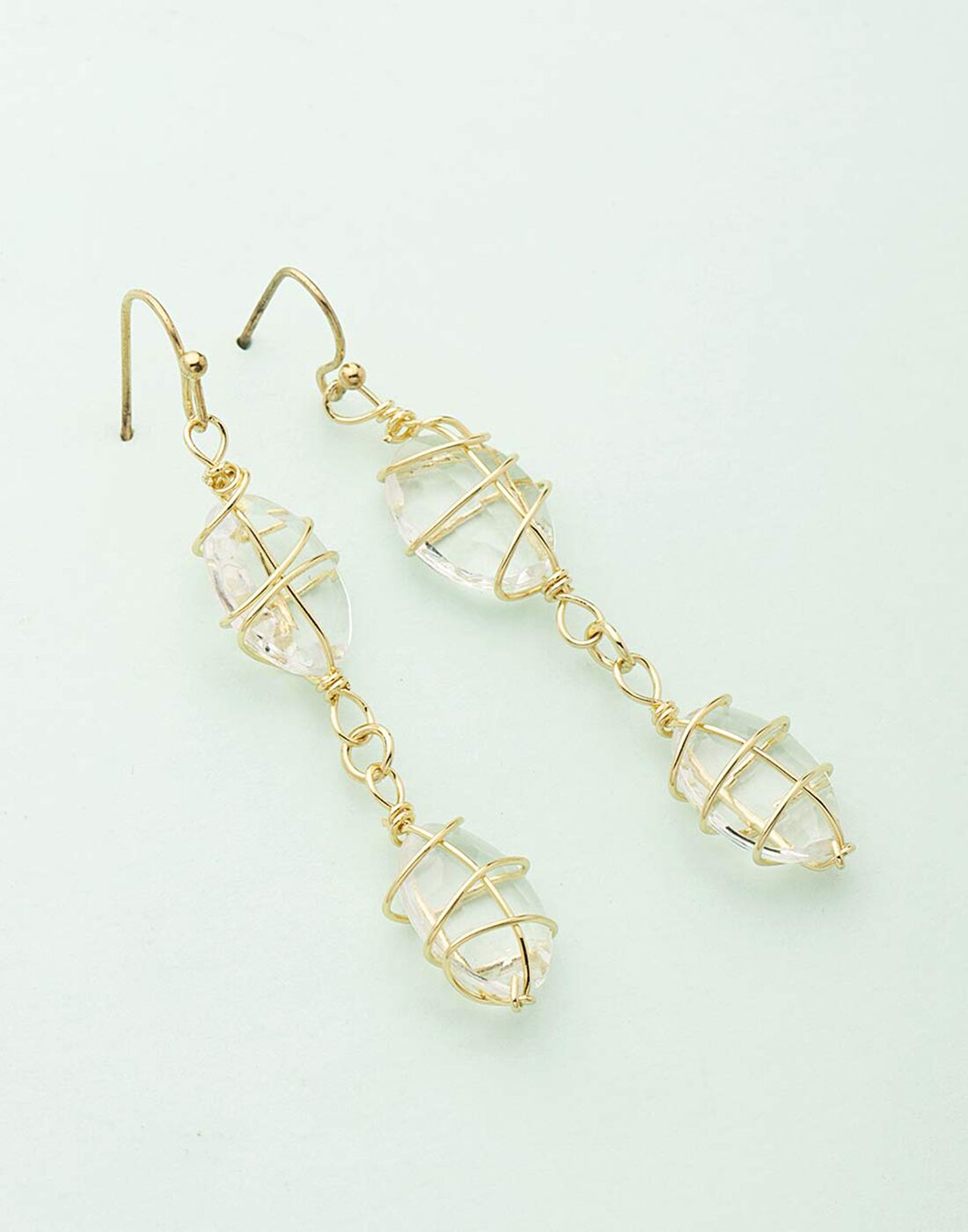 

Voylla Crystal Stone With Golden Wire Frame Earrings