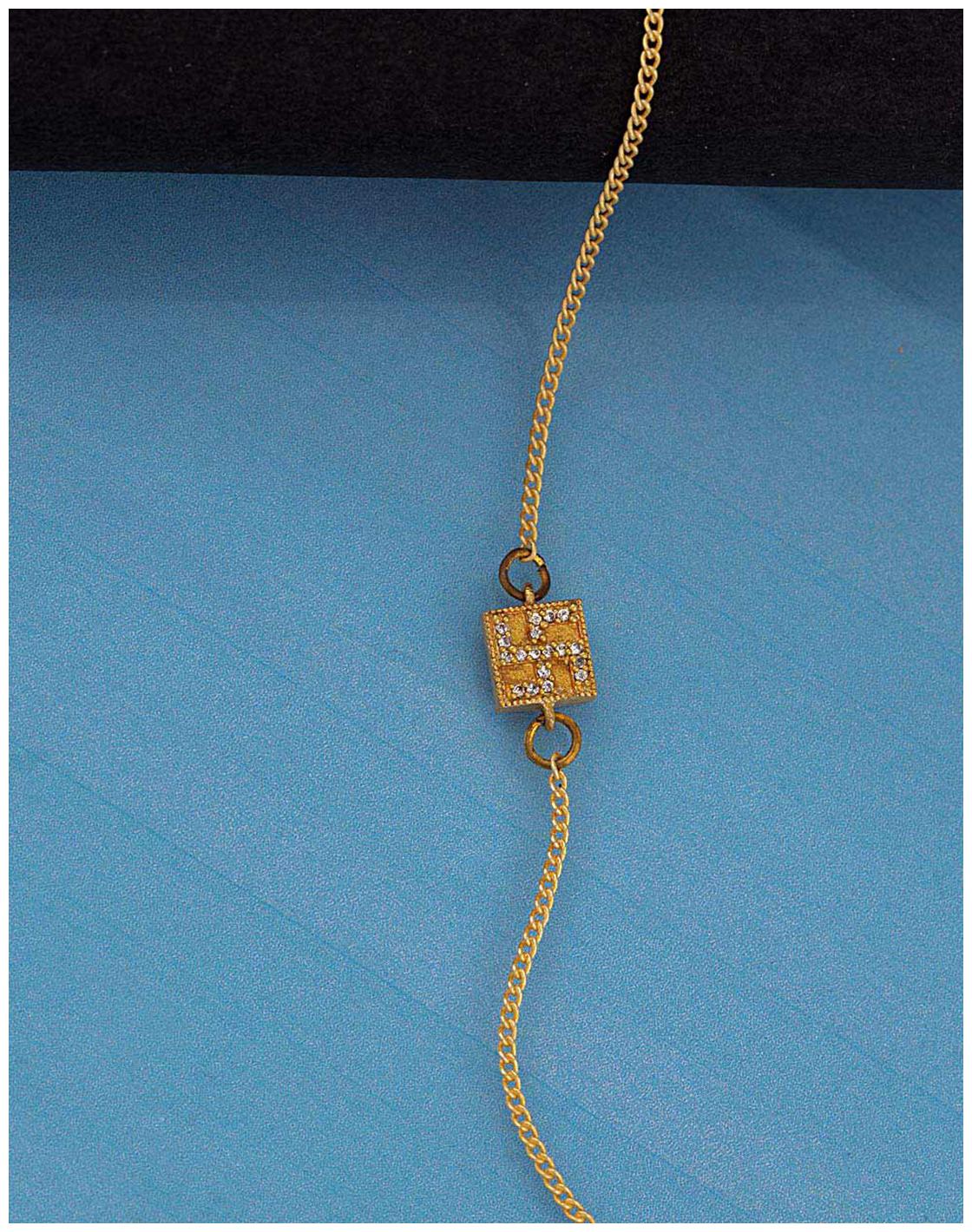 

Voylla Magical Golden Rakhi Bracelet With A Shimmering Swastika Symbol