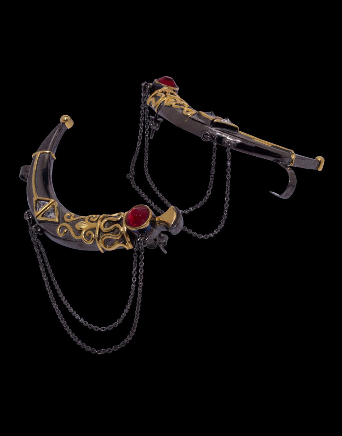 

Voylla red stone decked dangler earrings with gold tone and black finish polish