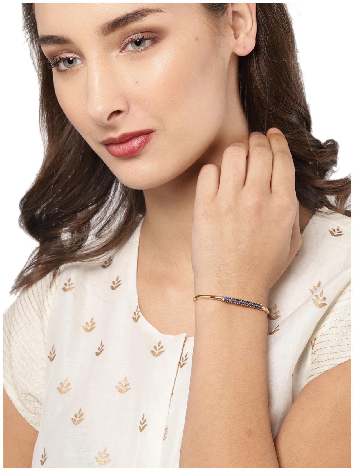 

Zaveri Pearls Gold Tone Cubic Zirconia Studded Openable Kada-ZPFK8443