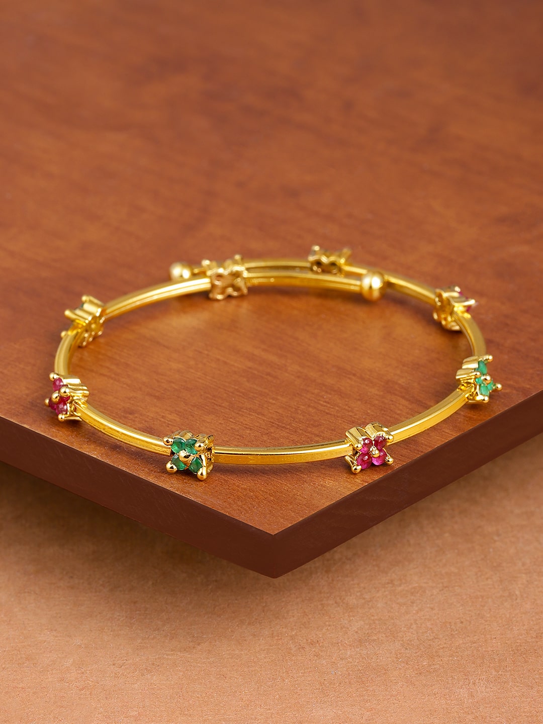 

Zaveri Pearls Pink Green Cubic Zirconia Contemporary Bangle Style Brass Kada-ZPFK9435