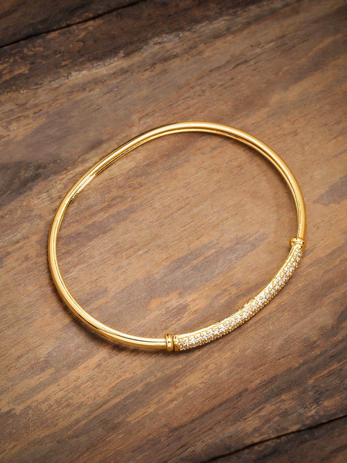 

Zaveri Pearls Contemporary Look Cubic Zirconia Bangle Style Brass Kada-ZPFK9214