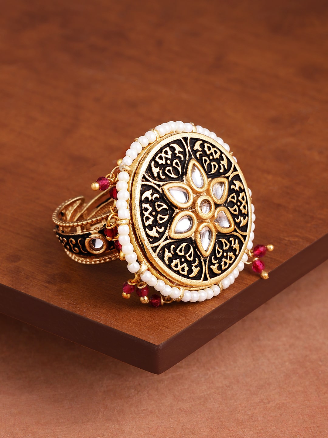 

Zaveri Pearls Dark Antique Kundan Flower Spinning Finger Ring-ZPFK9426