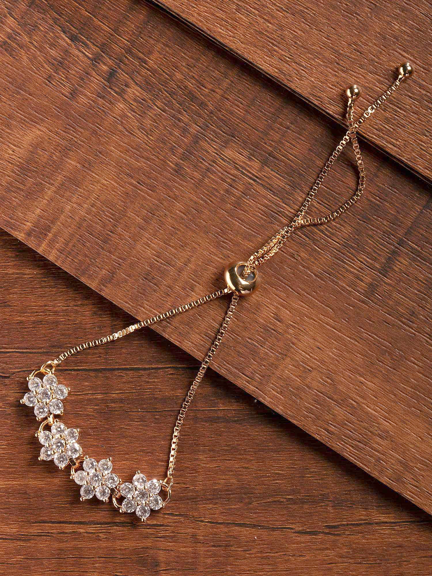 

Zaveri Pearls Cubic Zirconia Floral Drawstring Brass Bracelet-ZPFK9484
