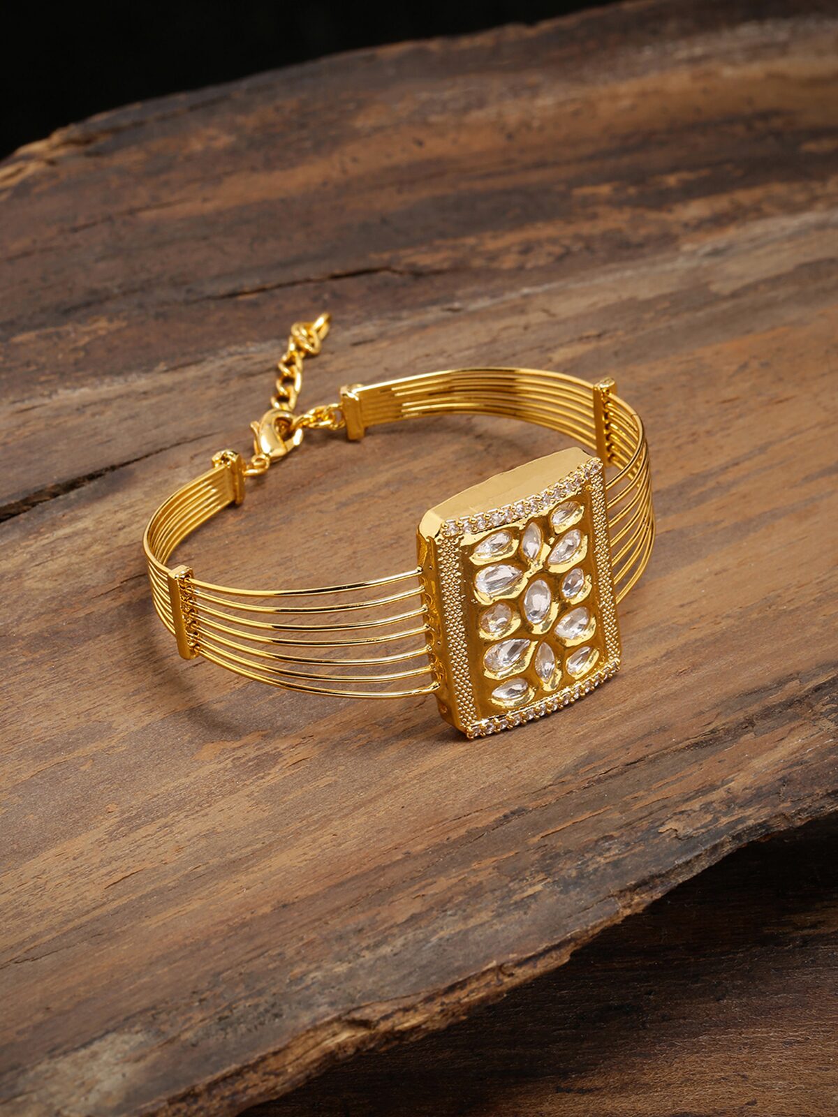 

Zaveri Pearls Gold Tone Cubic Zirconia Kundan Bangle Style Brass Kada-ZPFK9210