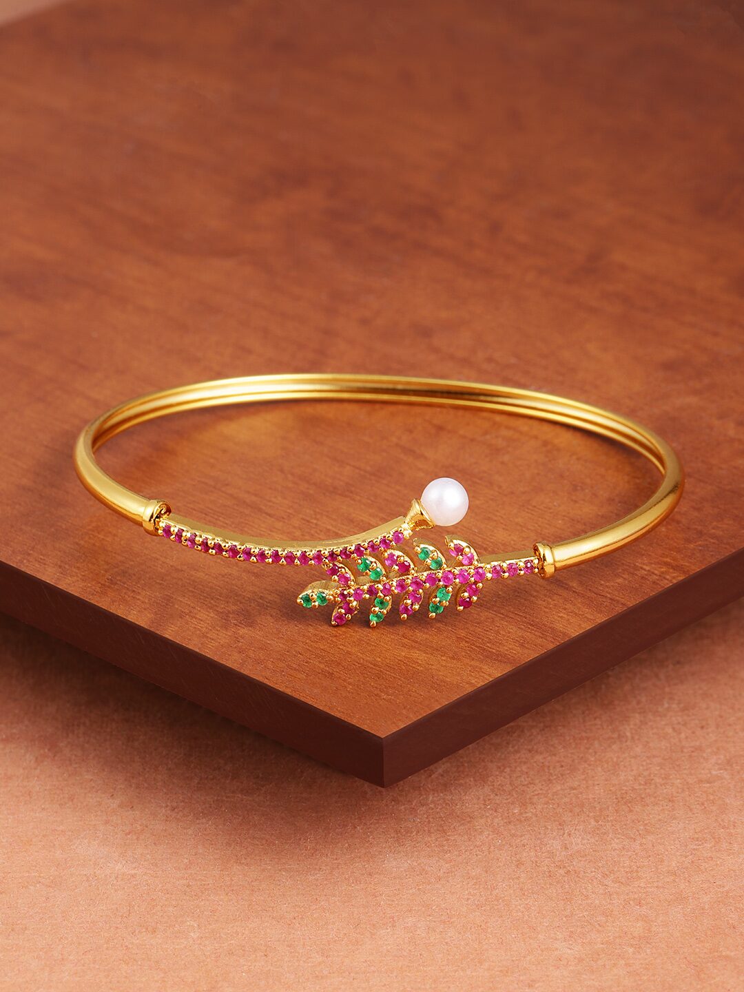 

Zaveri Pearls Pink Green Cubic Zirconia Contemporary Bangle Style Brass Kada-ZPFK9438