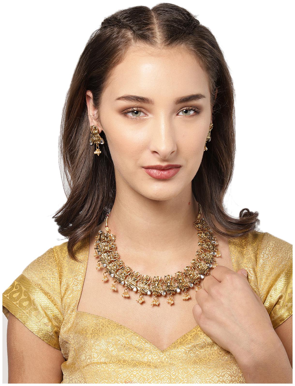 

Zaveri Pearls Antique Gold Tone Traditional Temple Necklace Set-ZPFK8466