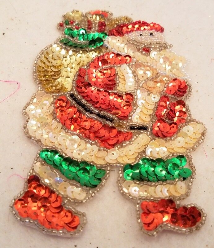 

Santa Claus Patch carrying a sack full of gifts sequins beads Sew or Glue on